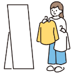 服を選ぶ女性